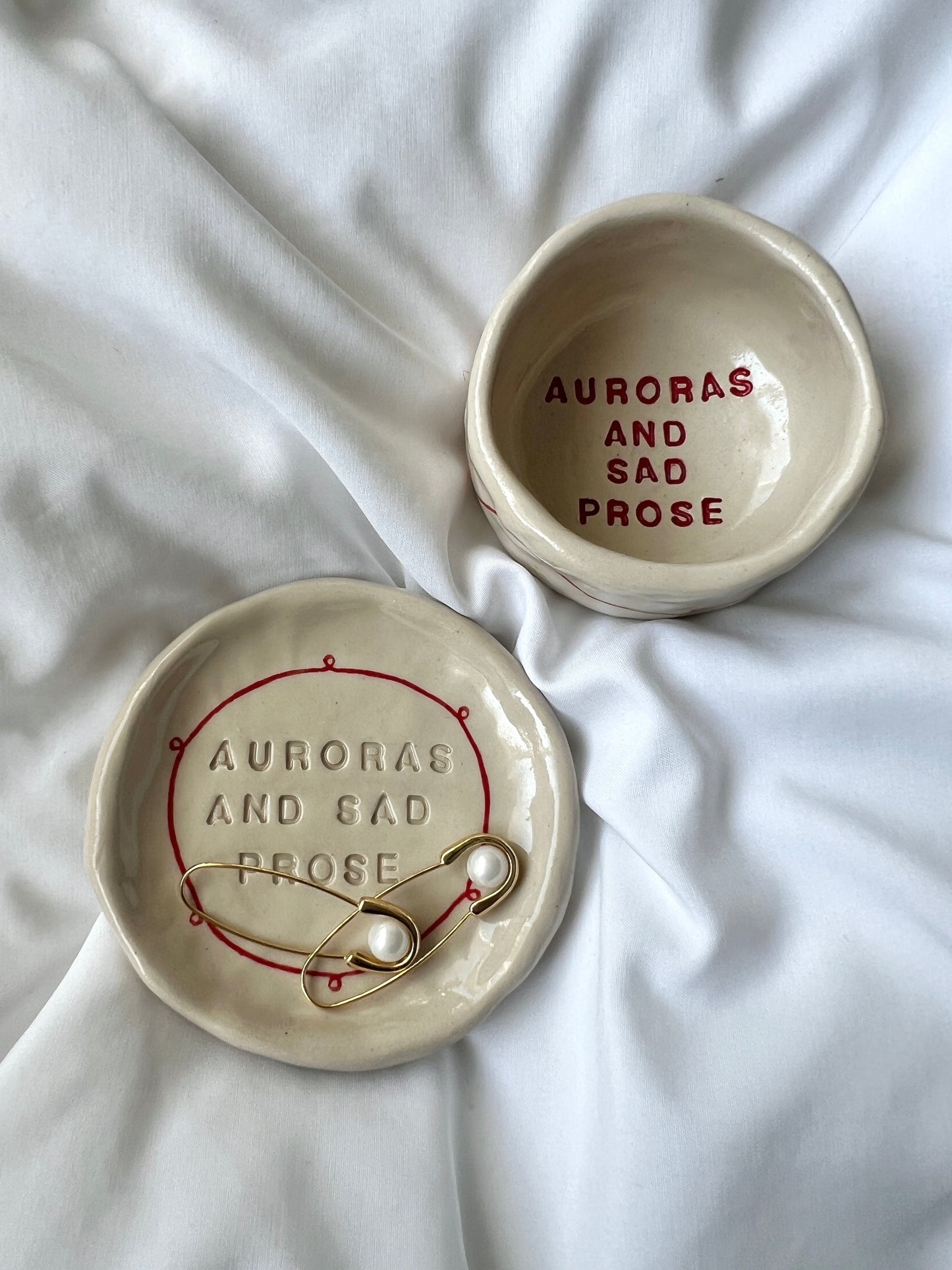Auroras and sad prose plate