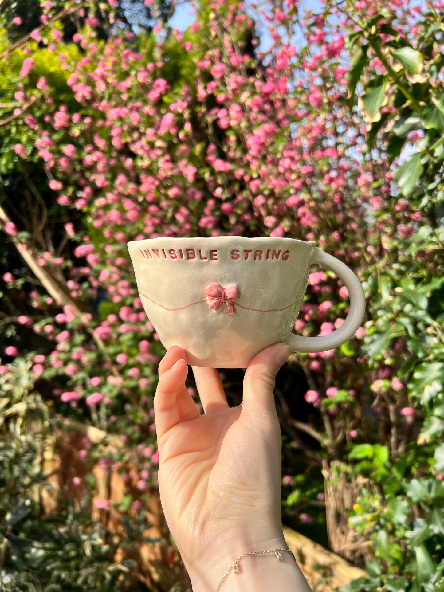 Invisible string mug