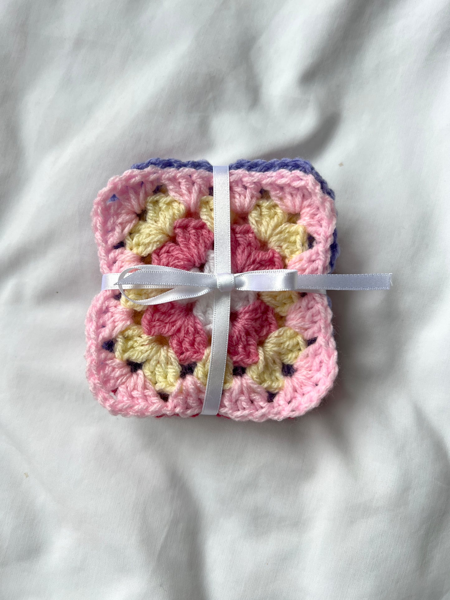 Pink crochet coaster set