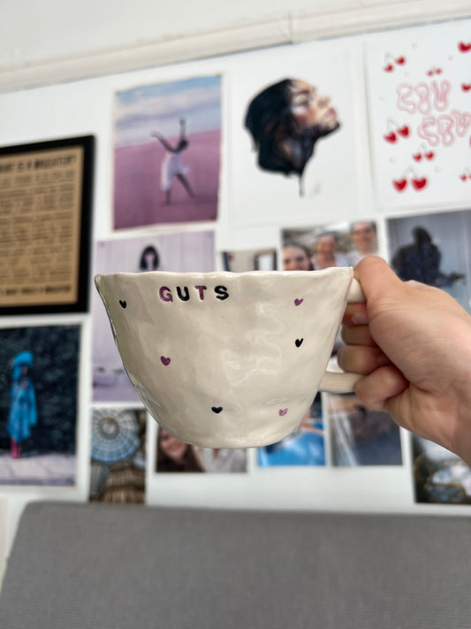 GUTS mug