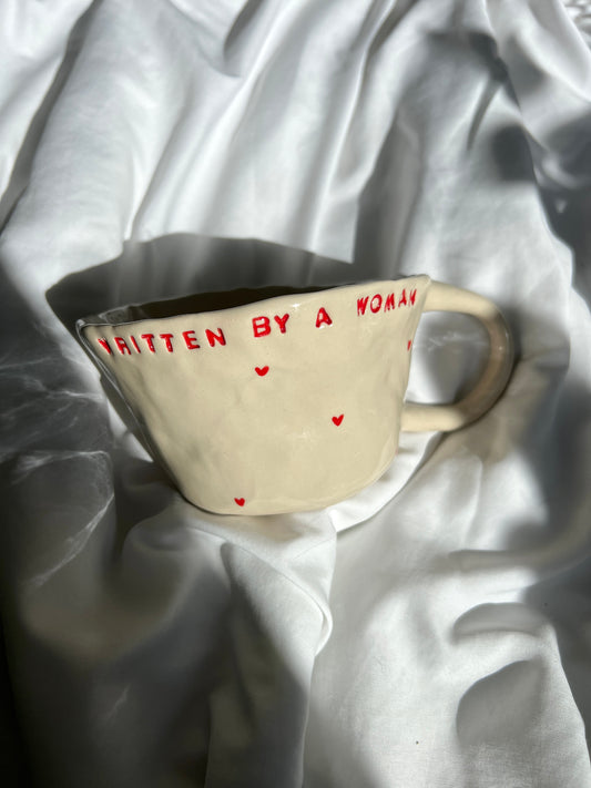 The Written by a Woman mug