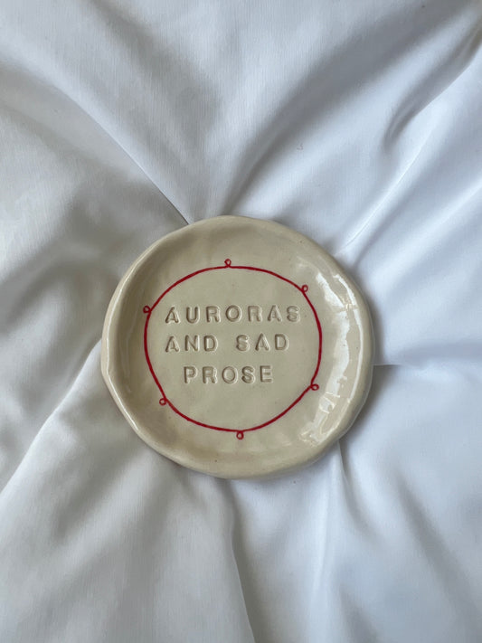 Auroras and sad prose plate