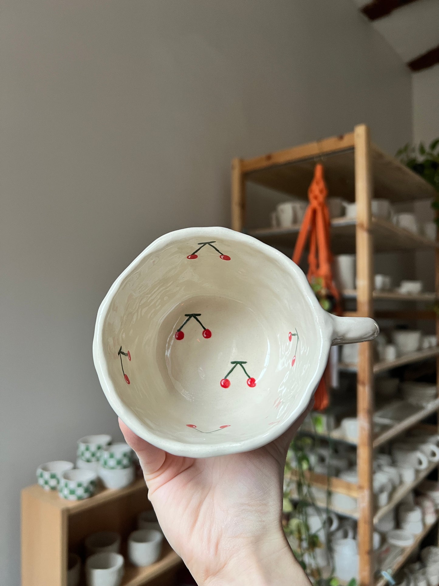 Inverted cherry mug