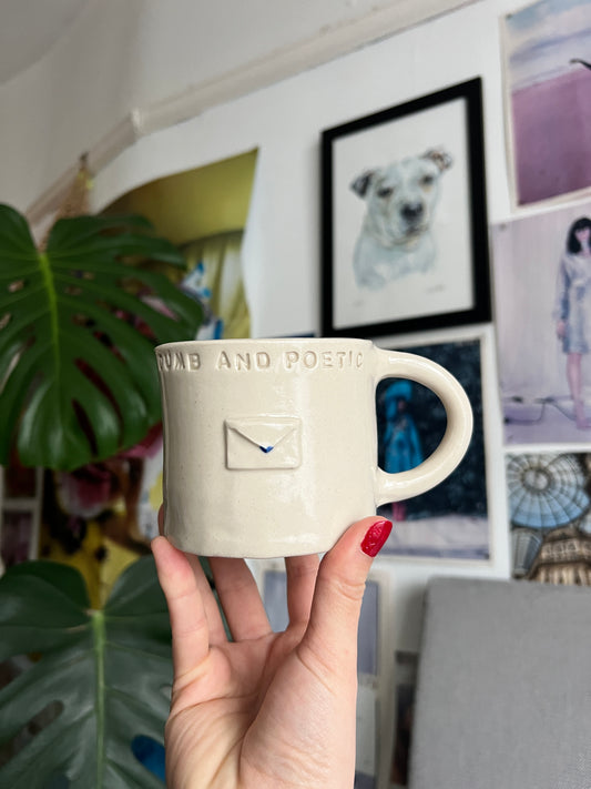 Dumb and Poetic seconds mug